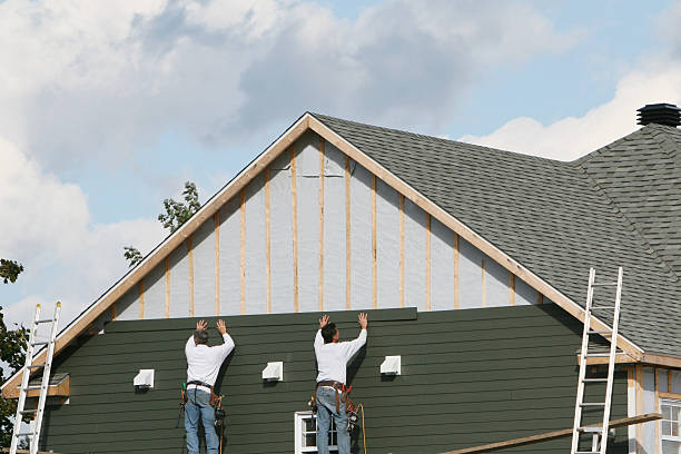Professional Vinyl Siding technician working in Baden, PA